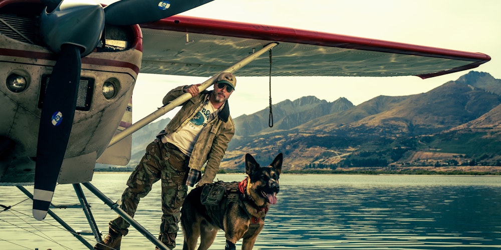 Man and German Shepherd on a seaplane float in Heart Of The Beast, Jam Jar still